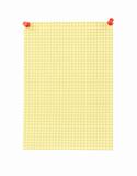 yellow blank thumbtacked squared paper page 