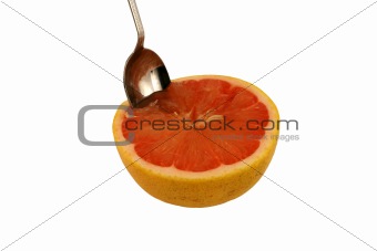 Isolated pink grapefruit half with spoon