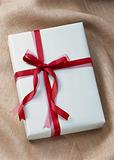 White Gift with Red Ribbon