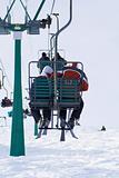 Skiers on lift