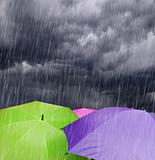 Umbrellas in Rainy Storm Clouds