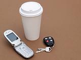coffee, keys and cellular phone