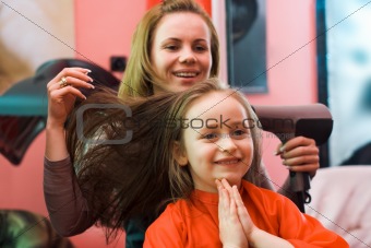 At the hair stylist