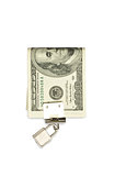 Dollars under lock and key on the white background