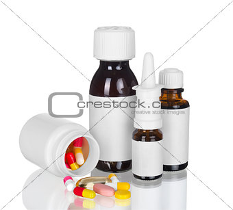 bottle for medicine with caps over white