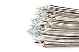 stacks of newspapers isolated on white