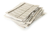stacks of newspapers isolated on white