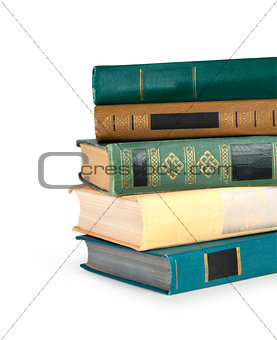 Old colorful books isolated on white background