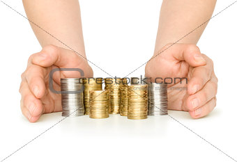 Stack of coins and hand