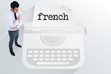 The word french and unsmiling businessman holding glasses