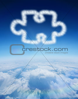 Composite image of cloud in shape of jigsaw piece