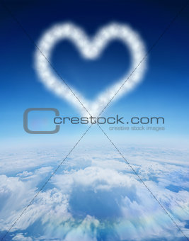 Composite image of cloud in shape of heart