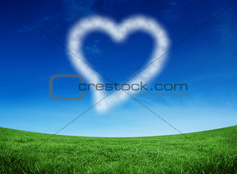 Composite image of cloud in shape of heart