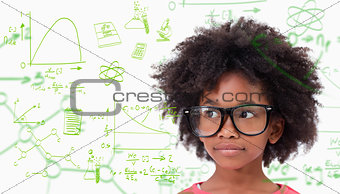 Composite image of cute pupil wearing glasses