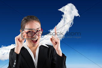 Composite image of young businesswoman getting an idea