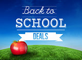 Composite image of red apple with back to school message