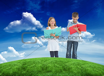 Composite image of brother and sister doing their homework together