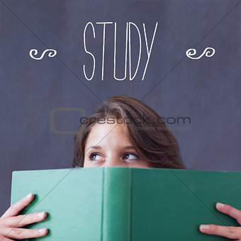 Study against student holding book