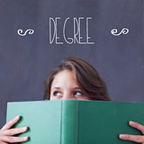 Degree against student holding book