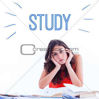 Study against stressed student at desk