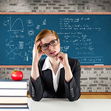 Composite image of thinking redhead teacher