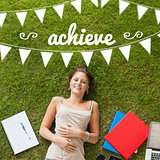 Achieve against pretty student lying on grass