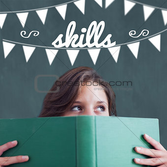 Skills against student holding book