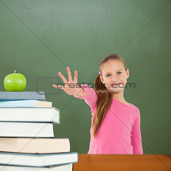 Composite image of cute girl with hand out