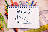 Composite image of trigonometry on notepad