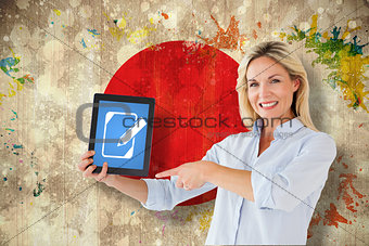 Composite image of mature student pointing to tablet