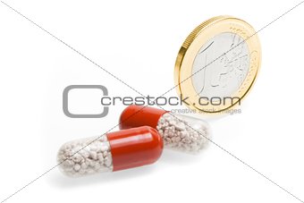 euro coin and medical pills