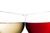cheers, closeup of two glasses of red wine and white wine