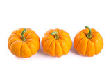 Row of decorative orange pumpkins 