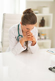 Portrait of frustrated doctor woman in office