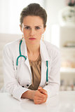 Portrait of confident doctor woman in office