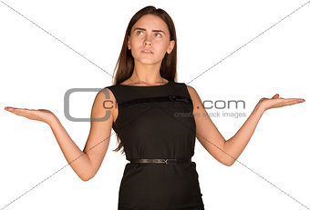 Businesswoman in dress showing empty palms