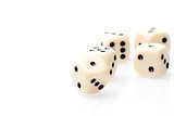 white dice on white table with space for text
