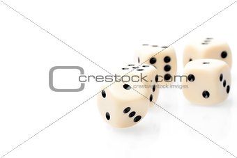 white dice on white table with space for text
