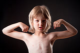 Boy Showing his Muscles