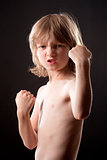 Boy Striking a Fighting Pose
