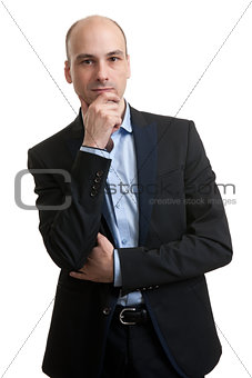 Businessman thinking with hand on chin