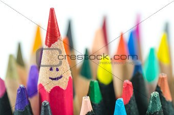 close up of colorful pencils on white background