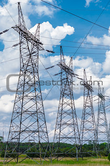 Pylon and transmission power line in summer day