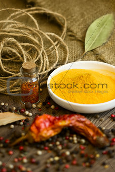 Turmeric in saucer with spices
