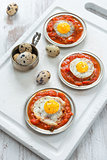 Omelette of quail eggs with tomato sauce