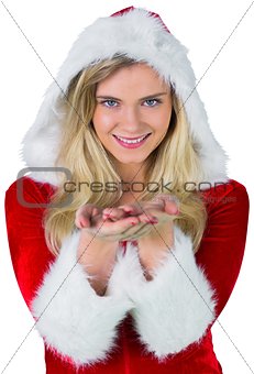 Pretty girl in santa outfit with hands out