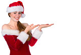 Pretty redhead in santa outfit presenting with hands