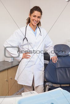 Confident dentist smiling at the camera