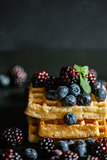 Waffles and fruit.