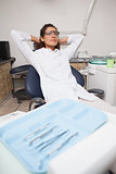 Dentist sitting back and relaxing